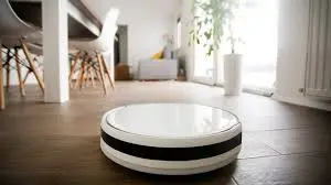 Robot vacuum cleaning a living room 